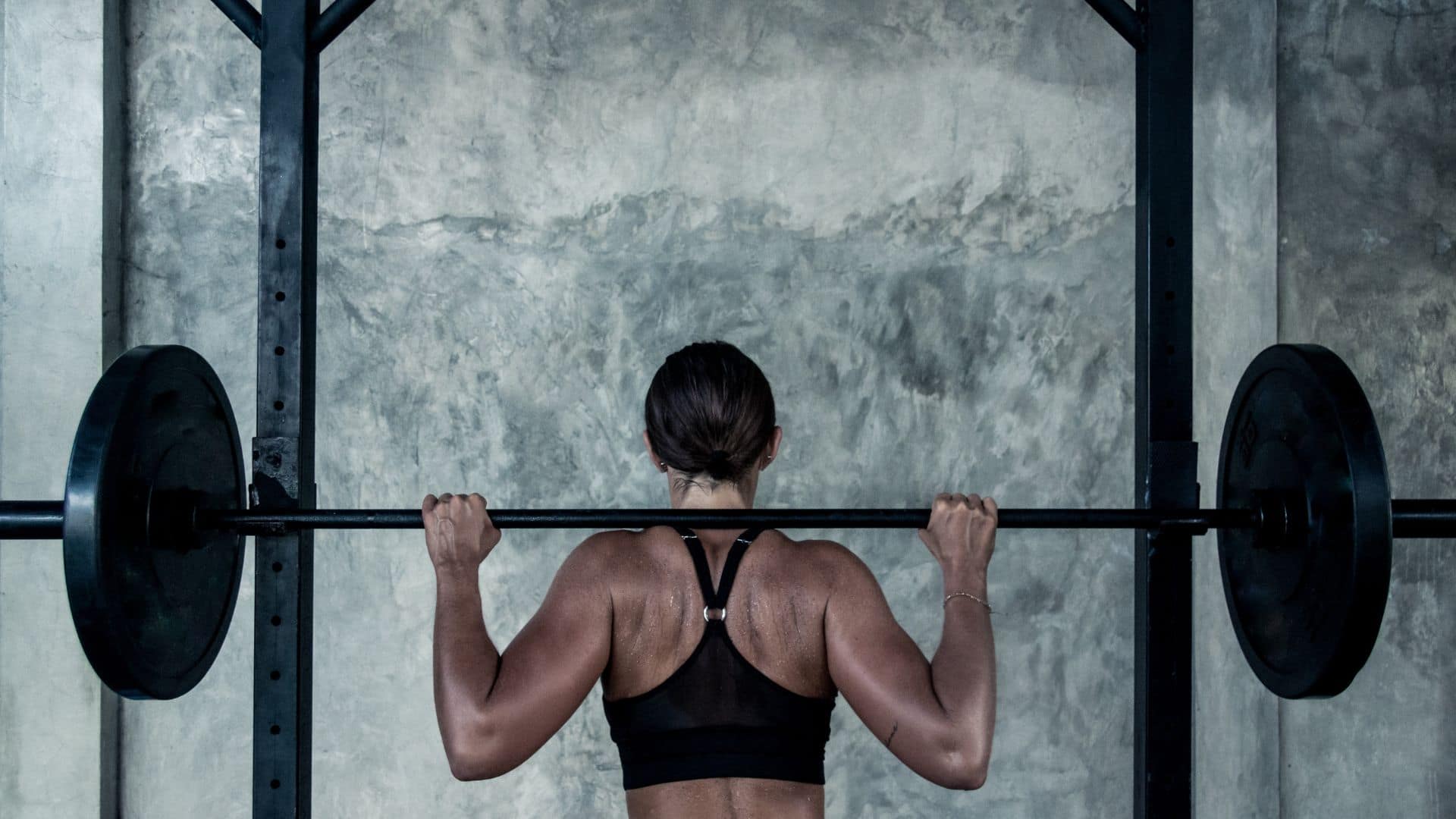 Woman doing a back squat