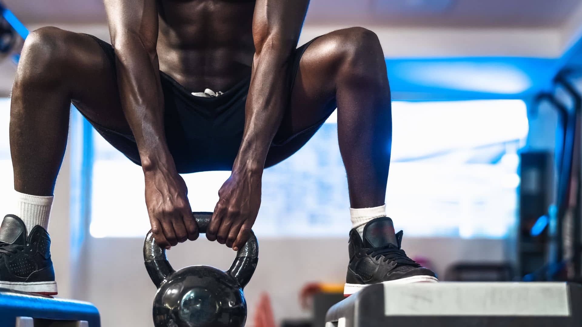 Fit Man Lifting Kettlebell