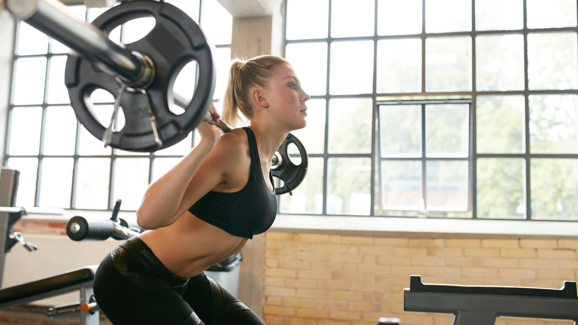 Woman Doing BACK Squats