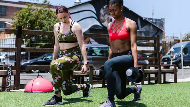 Women in Activewear Doing Exercise