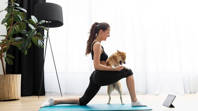 young-woman-doing-yoga-her-dog (1).jp