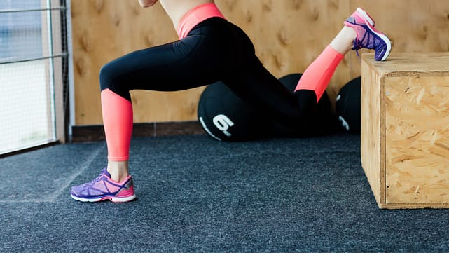 fit-young-woman-box-jumping-crossfit-style-gym-female-athlete-is-performing-box-jumps-gym.