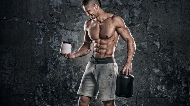 Bodybuilder with supplements