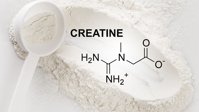 Scoop of Creatine Monohydrate Supplement and Chemical Formula