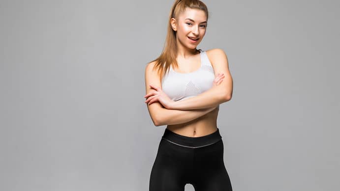cheerfully-smiling-sporty-woman-posing.jp