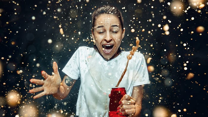 Woman drinking a cola