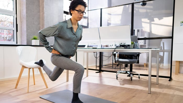 African Squat Employee Doing Bulgarian Split Squat Exercise