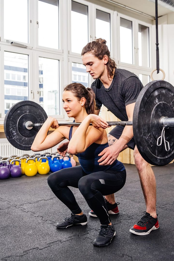 Woman Doing Squats ....