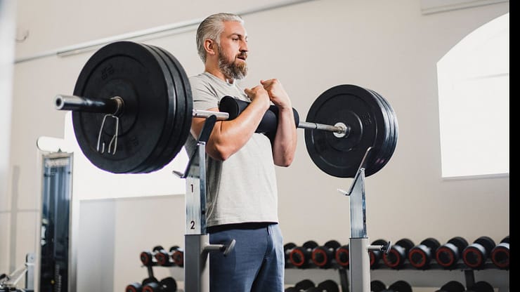 Mid-Adult Man Performing a Zercher Squat